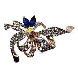 Vintage Gold-Tone Rhinestone Bow Brooch w/ Blue & Aurora Borealis Stones – 2”